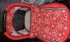 červený kvietkovaný kočík